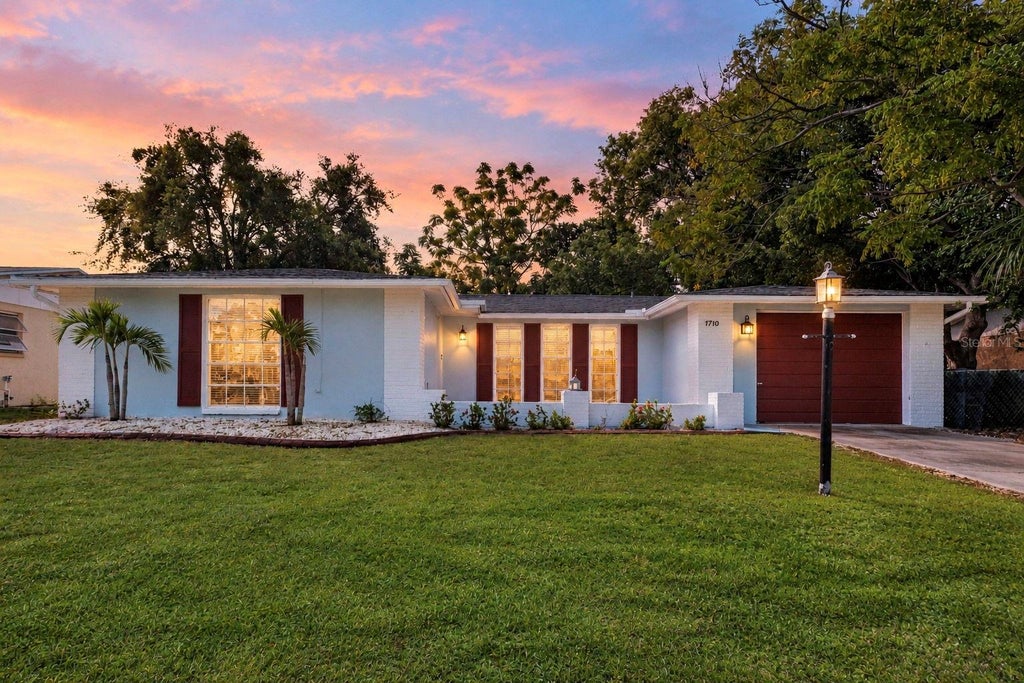 Photo of 7710 Birchwood Drive, Port Richey, FL 34668 (MLS # TB8533999)