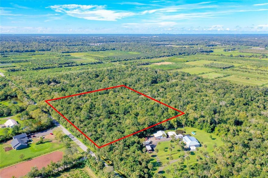A unique opportunity exists to acquire approximately 10 acres in the highly sought-after Black Hammock area of Oviedo. This property presents exceptional potential for various purposes, including establishing a private estate, engaging in agricultural activities, operating a hobby farm, utilizing it as a recreational property, investing in land, or envisioning future development in one of Central Florida’s rapidly expanding regions. It seamlessly integrates rural seclusion with convenient access to major employment hubs, retail establishments, and essential amenities. With the anticipated growth in the surrounding vicinity, this property offers a compelling opportunity for investors, builders, and developers seeking land in Seminole County. Conveniently situated just a short drive from SR-417, Oviedo Mall, the University of Central Florida (UCF), Downtown Orlando, Orlando International Airport (MCO), and the broader Orlando metropolitan area.