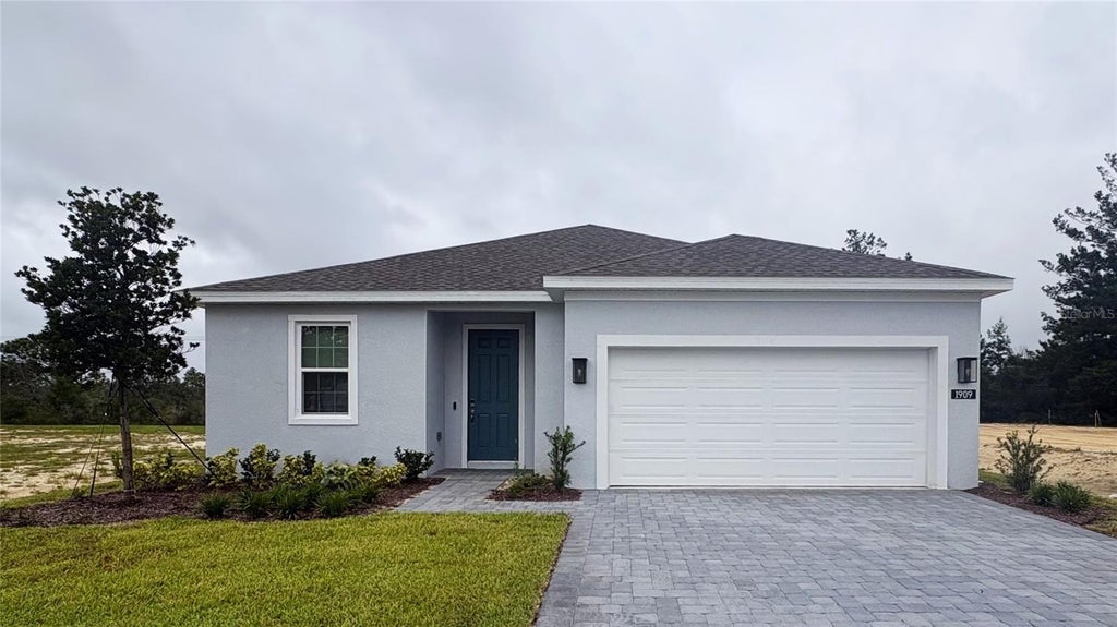 Photo of 1909 Greenborough Loop, Deland, FL 32724 (MLS # O6444940)