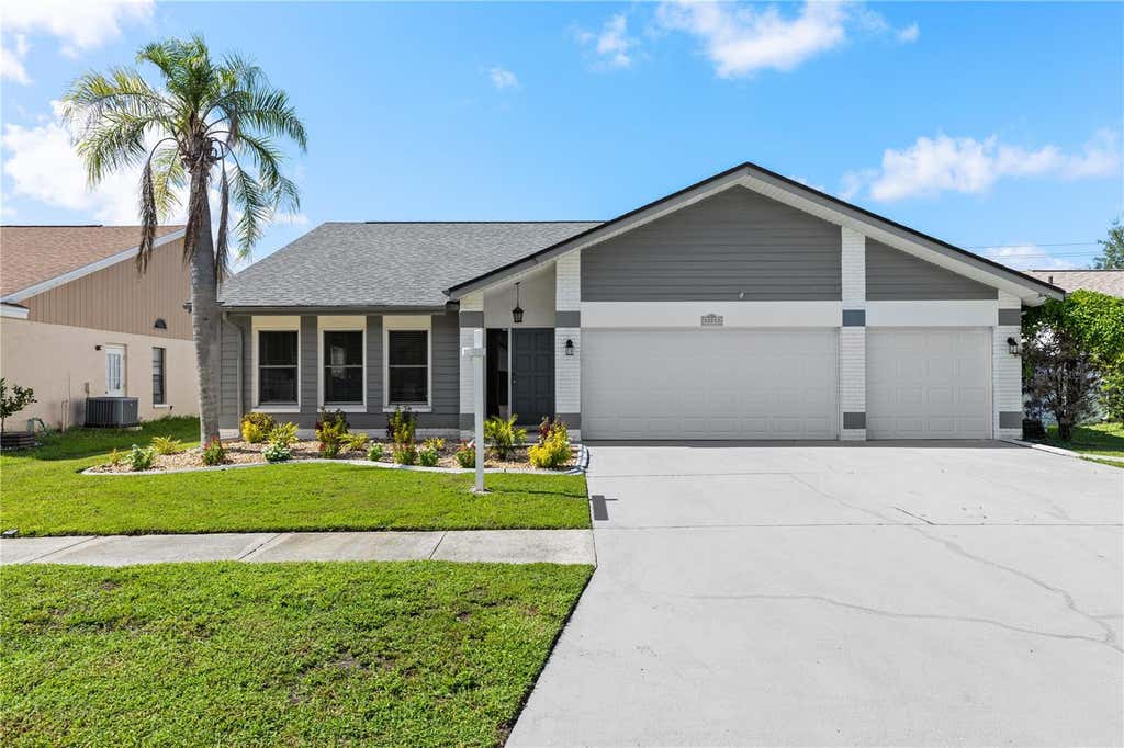 Photo of 12212 Steppingstone Boulevard, Tampa, FL 33635 (MLS # TB8533782)