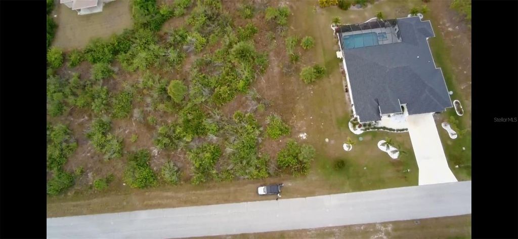 Photo of 9517 Sundance Street, Port Charlotte, FL 33981 (MLS # O6342727)