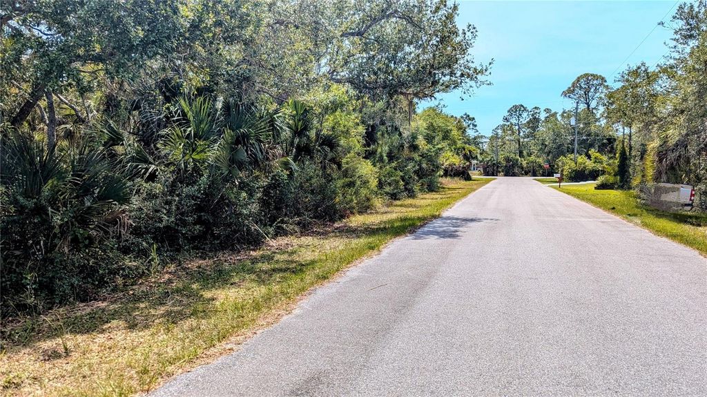Photo of 14323 Tugwell Avenue, Port Charlotte, FL 33953 (MLS # D6142456)