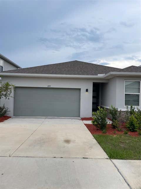 Photo of 1055 Sugarwood Street, Davenport, FL 33837 (MLS # L4963833)