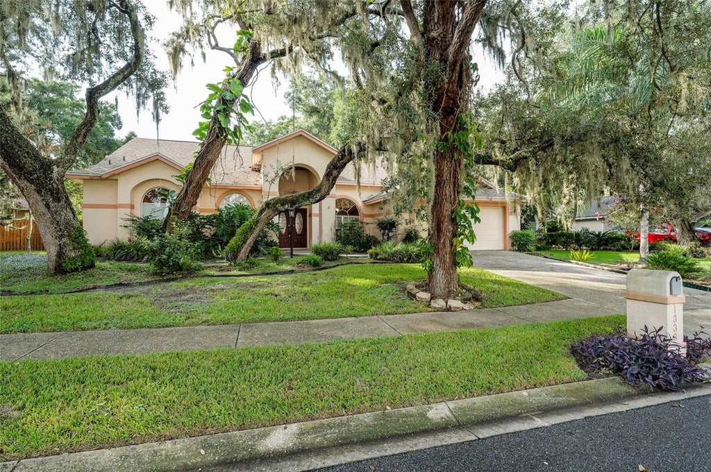 Photo of 1336 Waterwood Drive, Lutz, FL 33559 (MLS # TB8535520)