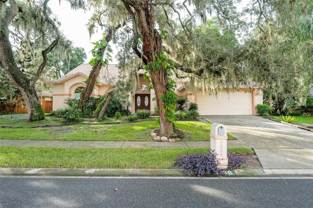 Photo of 1336 Waterwood Drive, Lutz, FL 33559 (MLS # TB8535520)