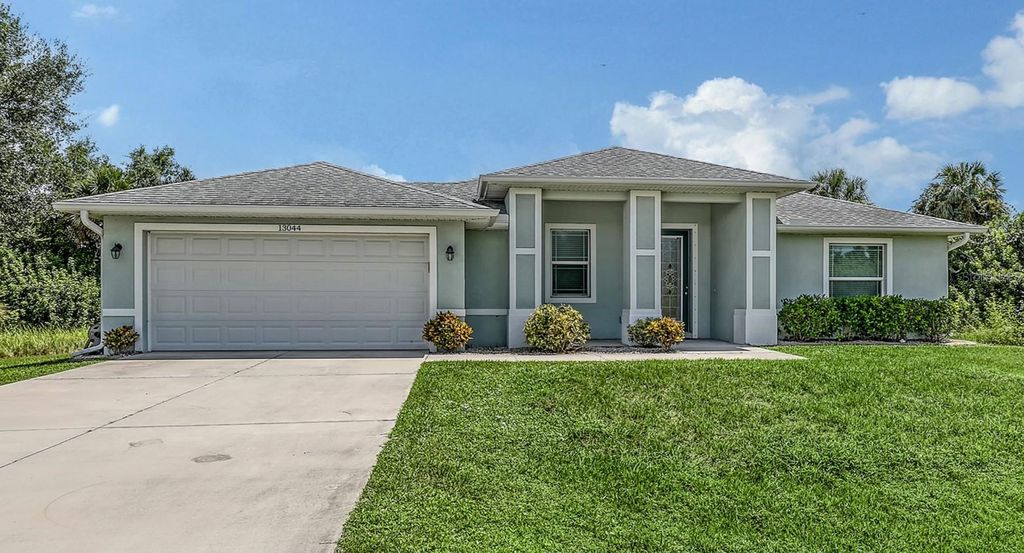 Photo of 13044 Marathon Boulevard, Port Charlotte, FL 33981 (MLS # C7513019)