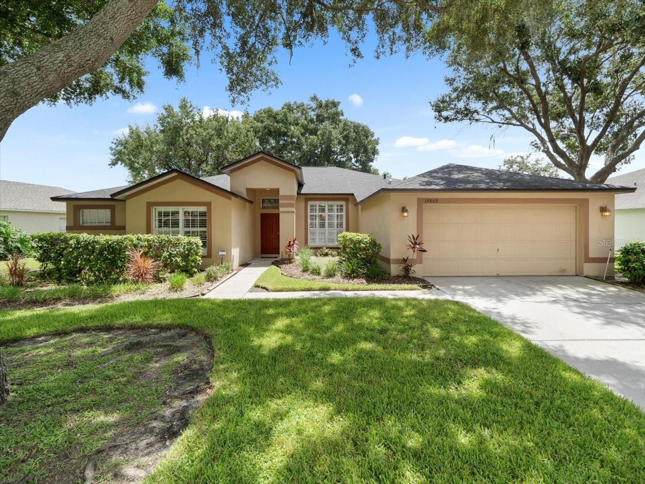 Beautifully maintained 4-bedroom, 2-bath home offering style, comfort, and functionality in the sought-after Steinbrenner School District. Gleaming hardwood floors and abundant natural light enhance an open yet well-defined layout, featuring a formal dining room, spacious living and family rooms. The gourmet-inspired kitchen boasts updated stainless-steel appliances, plentiful cabinetry, and a sunny breakfast nook—perfect for casual meals. The primary suite is a true retreat with generous space, dual vanities, and a separate shower, while three additional bedrooms provide flexibility for guests, hobbies, or additional workspace. Sliding glass doors lead to a private fenced backyard, ideal for dining al fresco, hosting barbecues, or simply unwinding. Conveniently located near parks, shopping, dining, and top-rated schools, this home is ready for you!