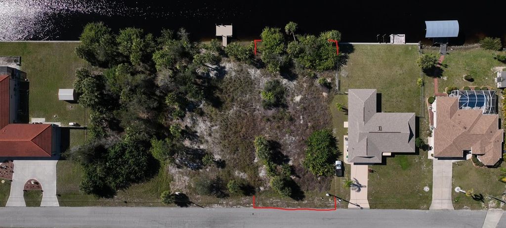 Photo of 3055 Cabaret St, Port Charlotte, FL 33948 (MLS # C7487651)