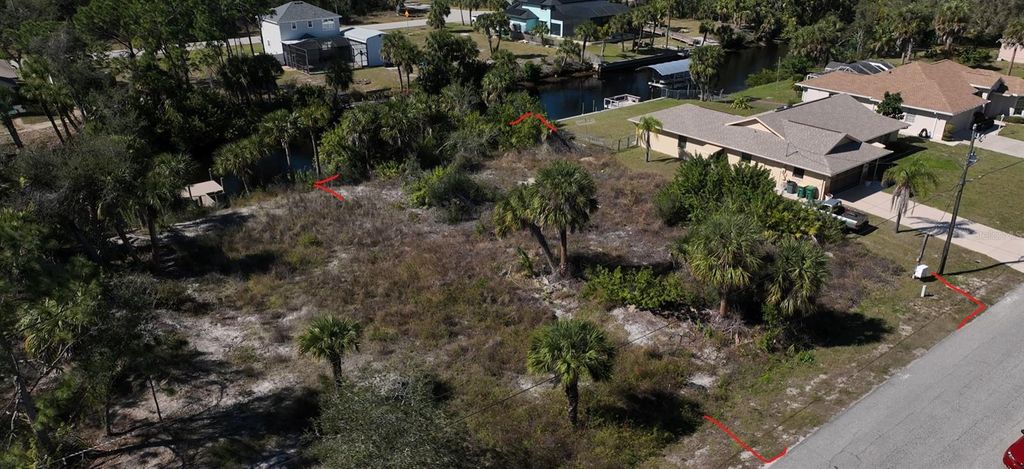 Photo of 3055 Cabaret St, Port Charlotte, FL 33948 (MLS # C7487651)