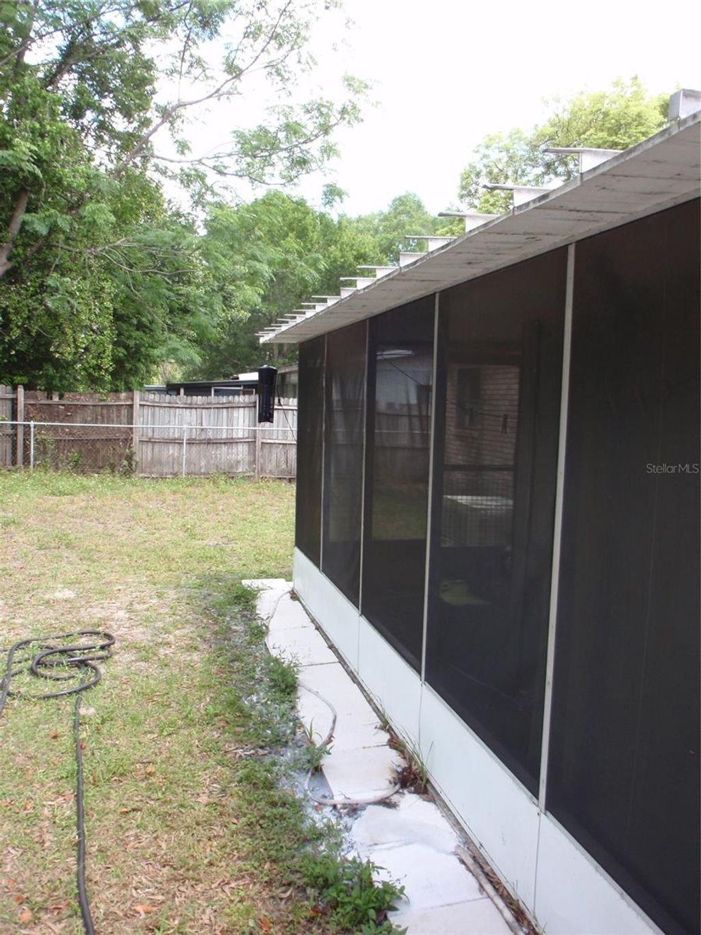 Photo of 10406 N 26th Street, Tampa, FL 33612 (MLS # O6391916)