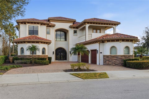 Photo of 971 Golden Bear Drive, Reunion, FL 34747 (MLS # O6438655)