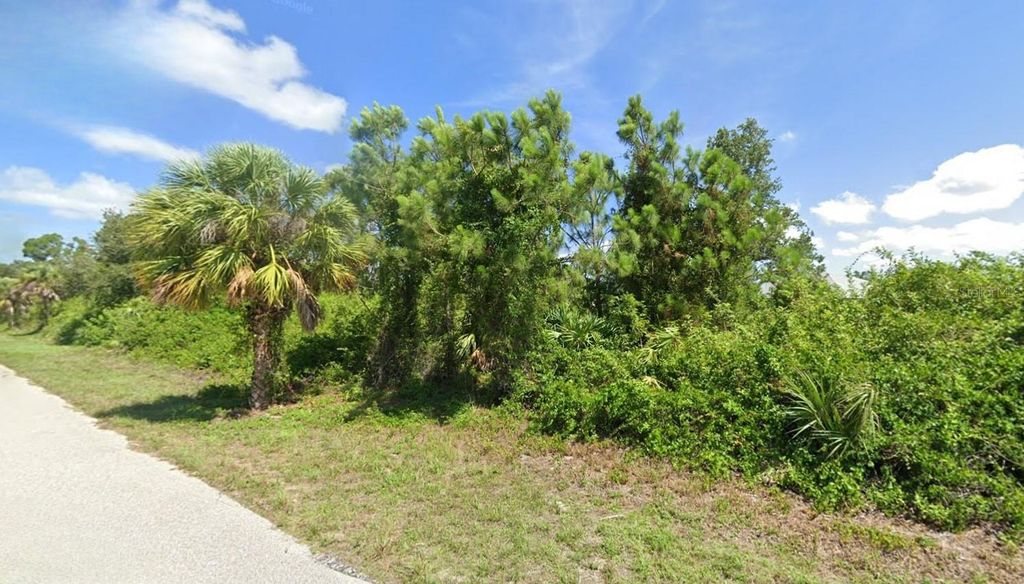Photo of 12420 Sunniland Avenue, Port Charlotte, FL 33981 (MLS # C7512405)