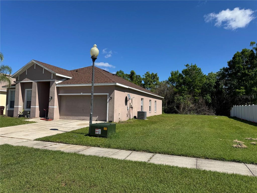 Photo of 877 Hacienda Circle, Kissimmee, FL 34741 (MLS # S5147690)