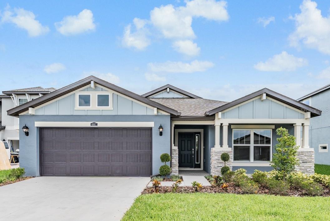 Brand new contruction single family home in the gated community of Carrollwood Landings. This home features an open floor plan with a kitchen island; quartz countertops; soft close drawers and cabinets; stainless steel appliances and all wood look tile throughout the home - No carpet! There is a den/study at the front of the home complete with French doors perfect for working from home. The laundry room is off of the garage and includes a washer and dryer. The secondary bedrooms are down the hall from the Great room and share the 2nd bath. The primary bedroom is at the back of the house and includes a large walk-in closet and bathroom complete with a large shower, dual vanities and a water closet. There is a covered porch off of the great room with a view to the community pond. This home is conveniently located close to shopping and dining. Carrollwood Village Park is located close by and features walking paths; a playground; splash pad; dog park and exercise areas.