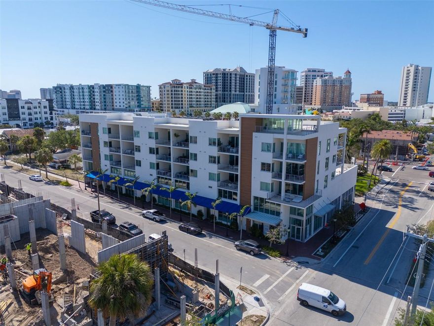 Modern 2 Bedroom Condo in the Heart of Sarasota’s Quay and Rosemary District
Welcome to the vibrant heart of Sarasota! Nestled in the sought-after Quay area and Rosemary District, this stylish 2-bedroom, 1-bath modern condo offers the perfect blend of urban convenience, luxury living, and cultural richness. With under-building parking, private storage, a community pool, and a pet-friendly policy, this boutique residence is ideal for those seeking a refined, low-maintenance lifestyle in one of Sarasota’s most dynamic neighborhoods. This intimate building features just 36 architecturally elegant residences, thoughtfully designed to deliver the ambiance and comforts of high-rise living—with concrete construction, sound-attenuated common walls, and low HOA fees
ensuring both quality and quiet. Inside, the condo boasts an open floor plan with vaulted ceilings, abundant natural light, and a sleek chef’s kitchen with quartz countertops, stainless steel appliances, and modern cabinetry. The primary bedroom includes a spacious walk-in closet and high ceilings, while the bathroom and full-sized laundry area add convenience to style. Built just three years ago, this residence is move-in ready and ideally positioned for the best of downtown living. You are just steps from Whole Foods, the Sarasota Opera House, award-winning restaurants, and the city’s beloved Saturday Farmers Market. Enjoy an evening stroll to nearby theaters, art galleries, craft coffee shops, and rooftop bars, or hop on the free Bay Runner Trolley for a scenic ride to St. Armands Circle and Lido Beach.
Whether you’re looking for a full-time residence or a chic Sarasota getaway, this condo delivers exceptional value, design, and location—right where it all happens.