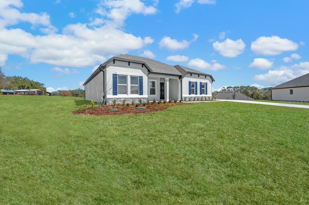 Photo of 3840 Saddle Hill Trail, Fruitland Park, FL 34731 (MLS # TB8535507)