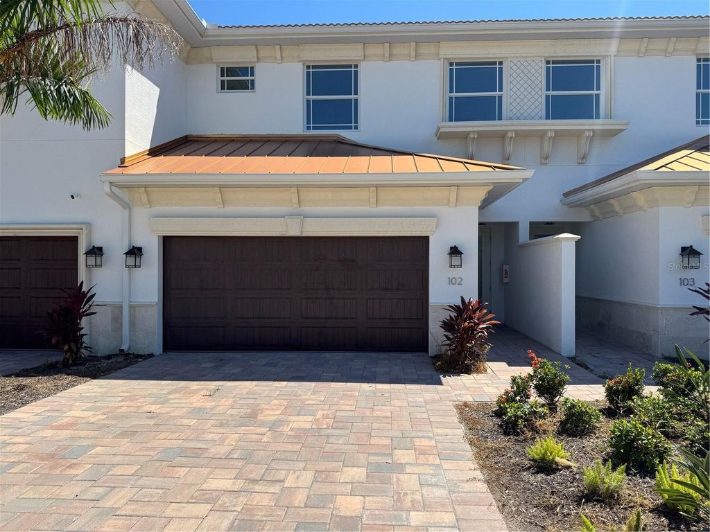 Photo of 7804 Hidden Creek Loop #103, Lakewood Ranch, FL 34202 (MLS # TB8429105)