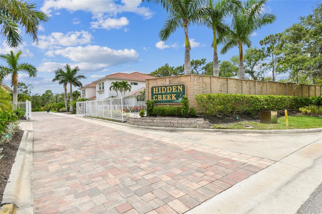 Photo of 7804 Hidden Creek Loop #103, Lakewood Ranch, FL 34202 (MLS # TB8429105)