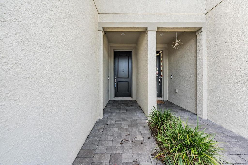 Photo of 19385 Blue Pond Drive, Lutz, FL 33558 (MLS # TB8411733)