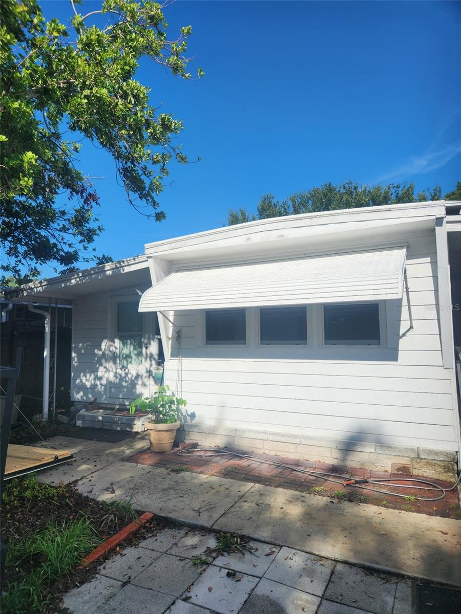 Discover a rare opportunity to own a piece of property with land in the heart of Pinellas County for just $150,000. This charming home offers more space than the square footage listed in MLS suggests, providing exceptional value in a highly sought-after location. Situated less than two miles from the beautiful Gulf beaches and even closer to shopping and everyday conveniences, the property offers both tranquility and accessibility. With no HOA, no community restrictions, and not located in a 55+ community, the possibilities are wide open—bring your whole family, and your furry friends too! The home features an updated kitchen and bathroom, Roof-over, central A/C, newer windows, and solid flooring throughout. All appliances, including the washer and dryer, are included for your convenience. While cash offers are required due to the age of the manufactured home, the value and freedom this property offers are truly unmatched. Whether you're looking for a full-time residence, seasonal escape, or investment opportunity, this home deserves your attention. Schedule your private showing today—homes like this don’t stay on the market for long!