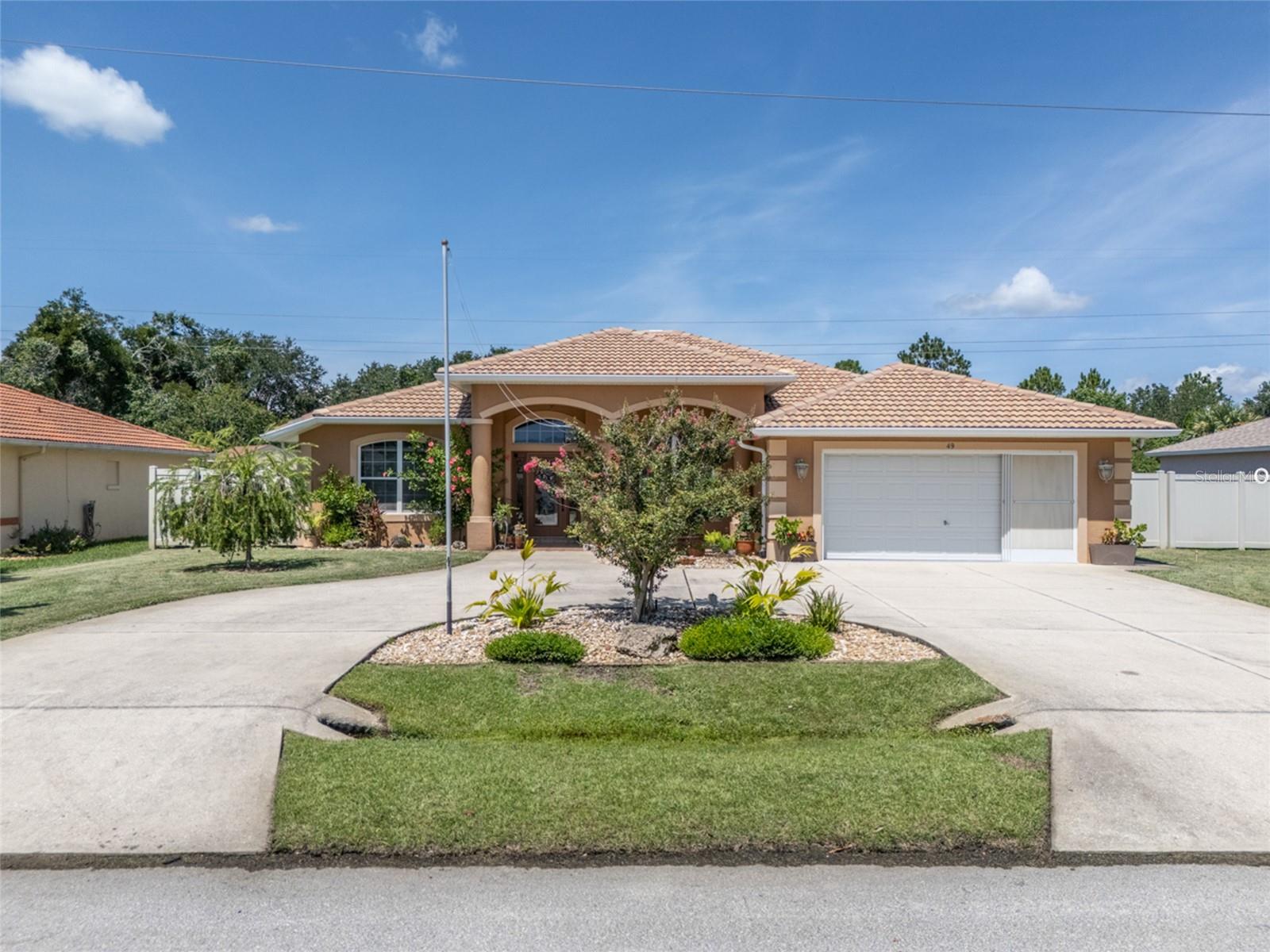 This Stunning 3-Bedroom, 3-Bath Pool Home with Entertainer’s Dream Lanai located in the desireable F Section.
Step into your own slice of paradise! This gorgeous BLOCK BUILT, 3-bedroom, 3-bath pool home offers the perfect mix of elegance, comfort, and Florida lifestyle. The bright, open layout is complemented by a formal dining room—perfect for hosting holiday dinners or intimate gatherings.
The split floorplan ensures privacy, with the primary suite tucked away as your personal retreat. Multiple living spaces make it easy to entertain or simply relax in style. Outside, prepare to be wowed! The oversized screened lanai and expansive patio are built for unforgettable poolside parties, weekend BBQs, or quiet mornings with coffee in hand. All of it frames your sparkling pool—the centerpiece of this incredible backyard. From the inviting curb appeal to the entertainer’s backyard, this home has it all. Don’t just live—live the Florida dream! New HVAC 2025.