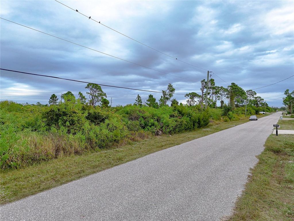 Photo of 12332 Appleberg Circle, Port Charlotte, FL 33981 (MLS # A4679041)