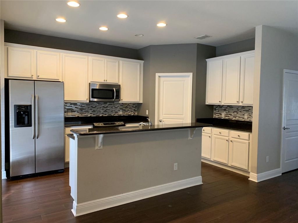 Photo of 7751 Fairgrove Avenue, Windermere, FL 34786 (MLS # O6369077)