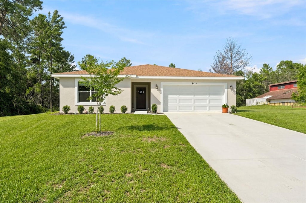 Photo of 8477 Beachwood Court, Spring Hill, FL 34606 (MLS # W7887906)