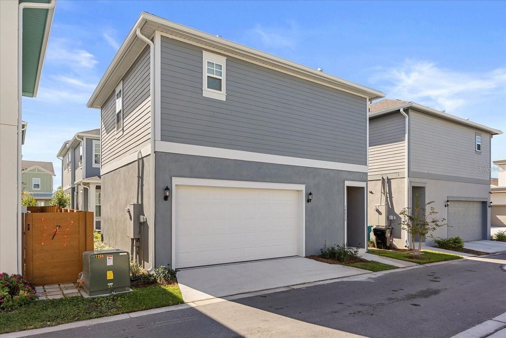 Photo of 10032 Hulse Alley, Orlando, FL 32827 (MLS # O6402207)