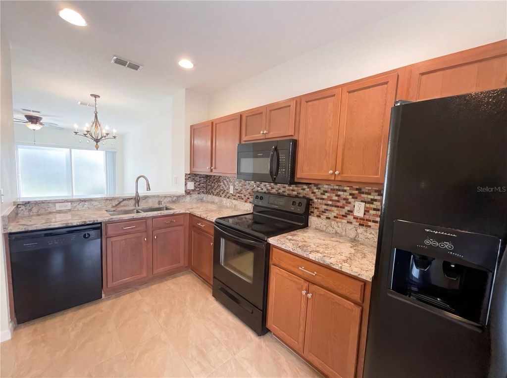 Photo of 8545 Trail Wind Drive, Tampa, FL 33647 (MLS # O6388638)