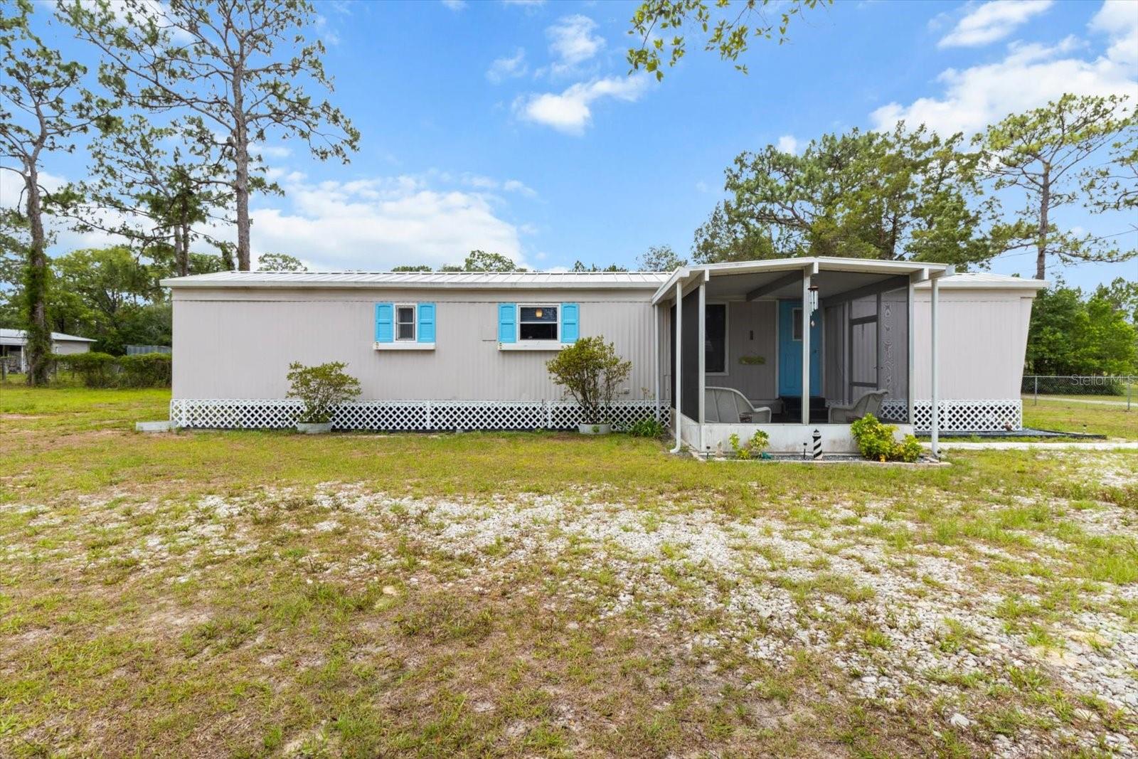 Great opportunity in Homosassa! BRAND NEW DRAINFIELD-a valuable upgrade that ensures worry free living for years to come! This 2 bedroom, 1.5 bath mobile home sits on a spacious half-acre lot with no HOA, offering plenty of room for your boat, RV, or other recreational toys. The property features a functional layout with potential for updates, making it ideal as a primary residence, seasonal getaway, or rental investment. Located just minutes from rivers, public boat ramps, restaurants and shopping. Enjoy the flexibility of a large lot and the convenience of being close to everything in the Nature Coast Don't miss this versatile property with room to grow!