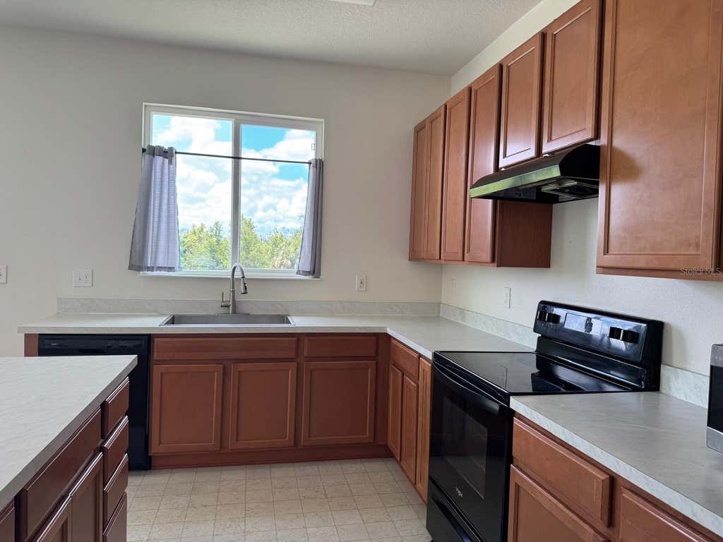 Photo of 709 Sarner Pass Way, Winter Haven, FL 33881 (MLS # S5153498)