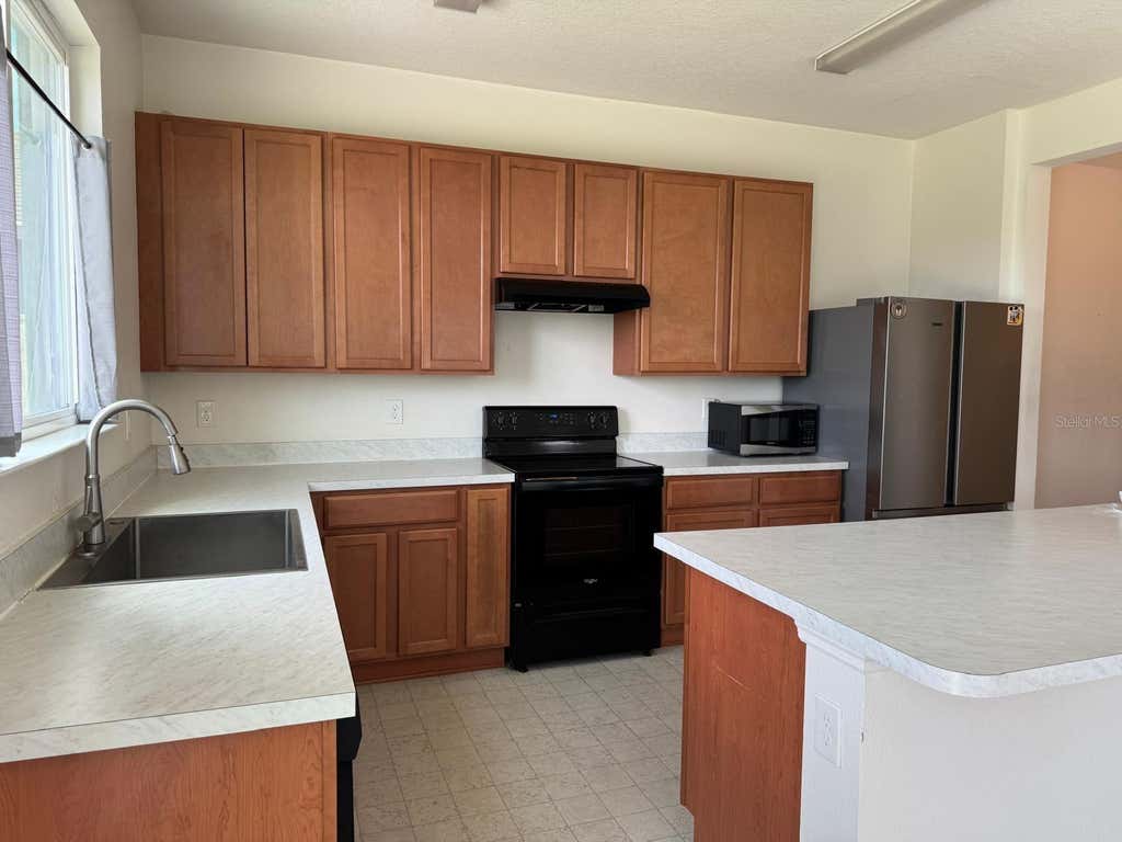 Photo of 709 Sarner Pass Way, Winter Haven, FL 33881 (MLS # S5153498)