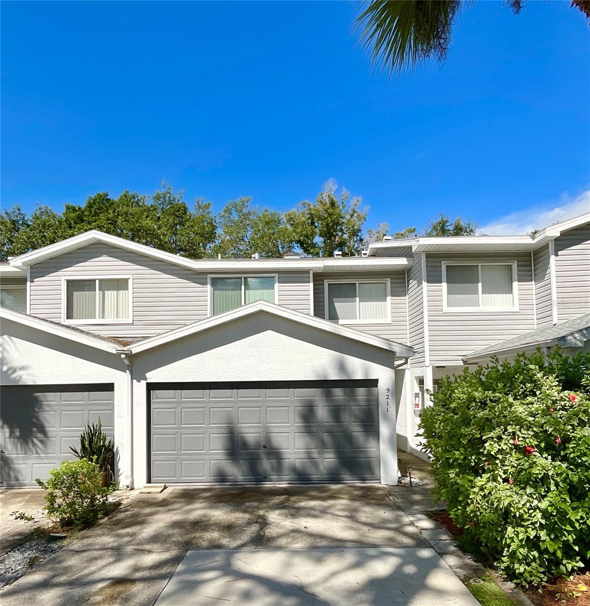 Welcome to Golfside Estates, a cozy townhome community surrounded by the beauty of mature trees and natural scenery. This well-maintained 3-bedroom, 2.5-bath home with a 2-car garage offers just under 1,500 square feet of comfortable living space in a prime location.
The first floor features an inviting foyer that opens to a bright living and dining area with easy-care laminate floors. The kitchen is well arranged with abundant wood cabinetry, a breakfast bar, and views out to your screened porch—perfect for morning coffee or evenings spent enjoying the peaceful, shaded landscape. A convenient half bath and garage access complete the lower level.
Upstairs, the spacious primary suite boasts high ceilings, an en-suite bath, and its own screened balcony overlooking the treetops. Two additional bedrooms, a full bath, and a laundry closet with washer and dryer provide easy everyday living.
Just a short shaded walk takes you to the sparkling community pool. Golfside Estates also neighbors the East Bay Golf Club for those who enjoy the game. The $410 monthly fee offers exceptional value, covering exterior maintenance, lawn care, irrigation, pool, water, sewer, trash service, cable TV, and even roof replacement.
Lovingly owned since 2002, this move-in ready home is attractively priced and available for a quick closing. Come see why Golfside Estates is the perfect blend of nature, convenience, and community.