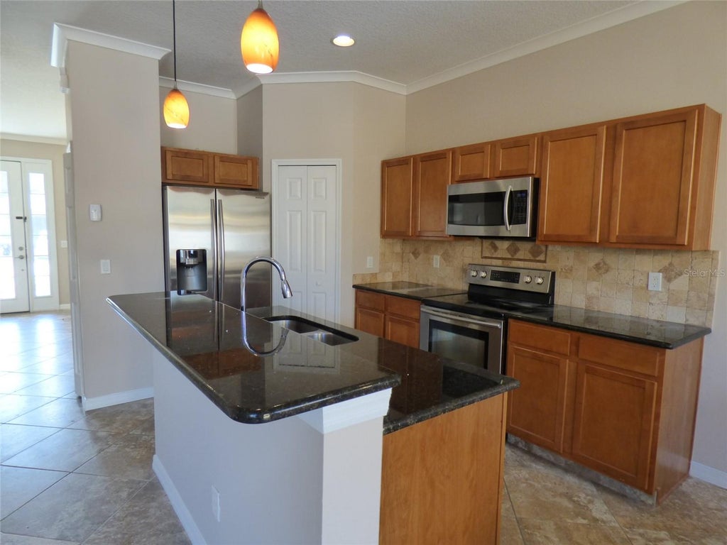 Photo of 6159 Chapledale Drive, Orlando, FL 32829 (MLS # O6453519)