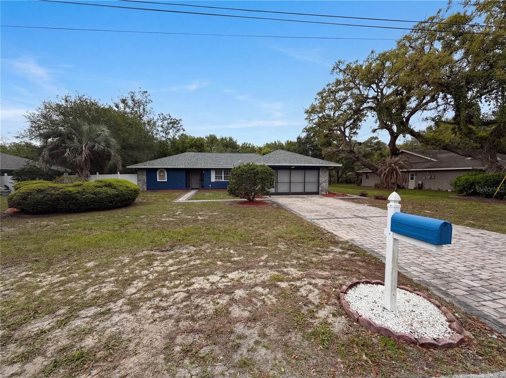 Photo of 7650 Holiday Drive, Spring Hill, FL 34606 (MLS # O6398236)