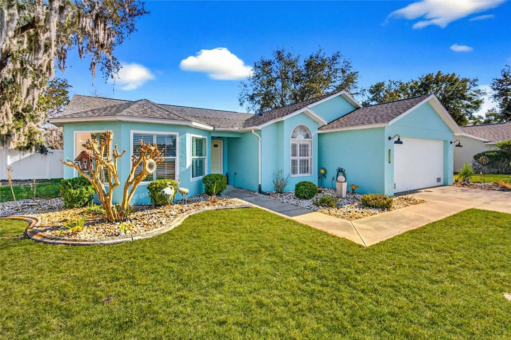 Photo of 5118 Royal Oak Drive, Fruitland Park, FL 34731 (MLS # FC316087)