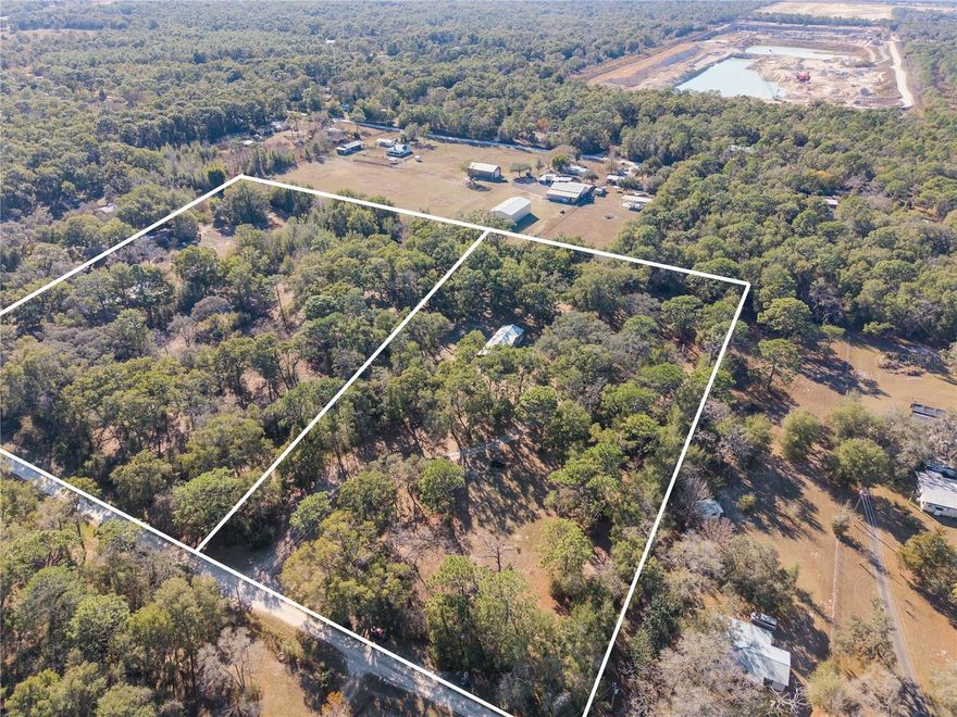 Fantastic opportunity to own 5 acres of buildable land zoned Agricultural, offering endless potential for those seeking space, privacy, and flexibility. This property provides the ideal setting to build a custom home while enjoying the benefits of AG zoning, with room for equipment, animals, and outdoor recreational use. Conveniently located with quick access to the Suncoast Parkway, and just minutes from restaurants, shopping, hospitals, and everyday amenities. The adjacent 5-acre parcel (MLS #W7882248) is also available and includes a manufactured home, creating a rare option for expanded acreage, future growth, or multi-parcel ownership.