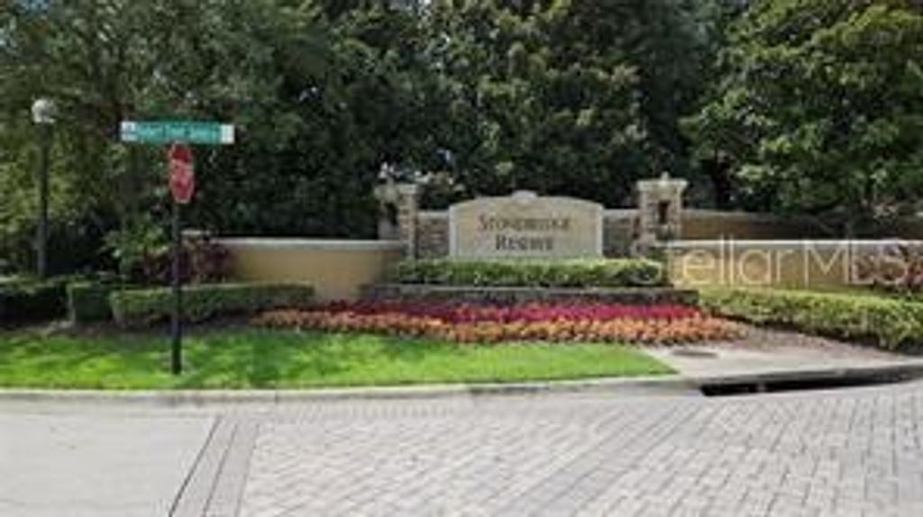 Photo of 3344 Robert Trend Jones Dr #202, Orlando, FL 32835 (MLS # O6390503)