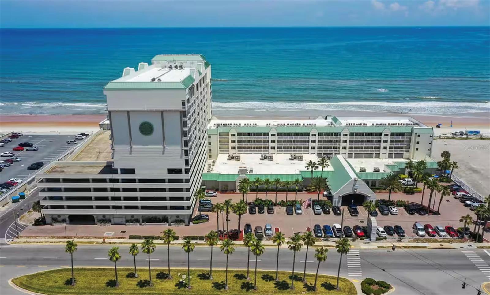 Don’t miss this rare opportunity to own the largest 1-bedroom unit available in the resort, offering direct oceanfront views and unobstructed panoramas from your private balcony. This fully furnished unit features 2 queen beds, a sleeper sofa, and a spacious open layout with a full kitchen, recently updated flooring, bathroom and newer central A/C system.
Enjoy unlimited owner usage or take advantage of flexible rental options—either through the in-house program or self-managed. Resort amenities include: Oceanfront pools, Indoor heated pool with Jacuzzis, Oceanfront Tiki bar, Full Nautilus gym, Sauna and On-site restaurant.
Conveniently located close to shopping, restaurants, and local attractions. Ideal as a vacation home, income-producing rental, or both!