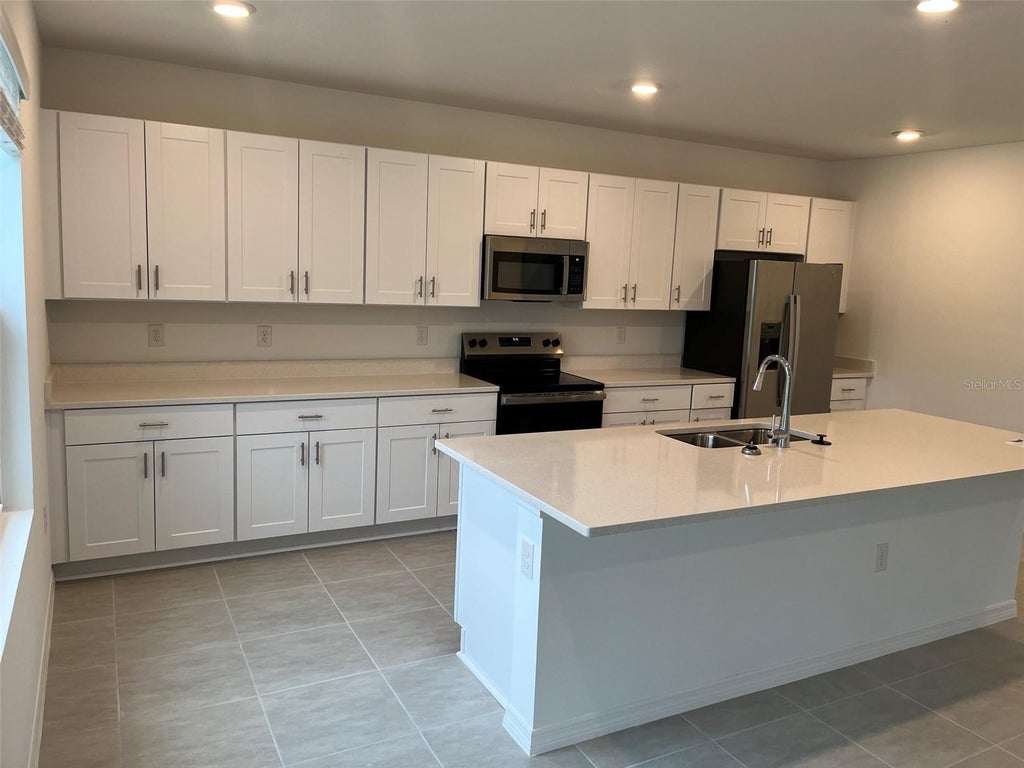 Photo of 325 River Front Way, Edgewater, FL 32141 (MLS # O6441812)