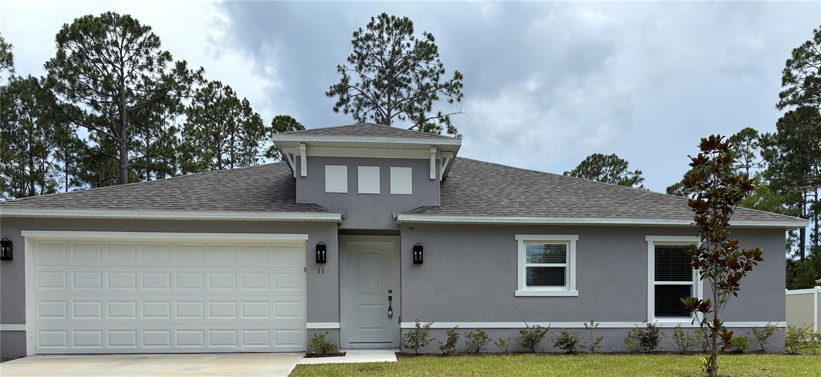 One or more photo(s) has been virtually staged. $500 OFF THE 1st MONTH RENT!! Welcome to this beautiful 3/2 Home in Palm Coast, FL, where comfort meets style. This stunning home boasts three spacious bedrooms and two full bathrooms, including a primary bathroom with a double vanity for added convenience. The open floorplan is perfect for entertaining, with solid surface countertops and vinyl plank flooring adding a touch of elegance to the space. The home is pet-friendly, ensuring your furry friends feel just as welcome as you do. Ceiling fans are installed throughout the home, providing a cool breeze during those warm Florida days. Step outside to the covered patio, a perfect spot for your morning coffee or evening relaxation.
All residents are enrolled in the Resident Benefits Package (RBP) for $62.00/month which includes liability insurance, credit building to help boost the resident’s credit score with timely rent payments, up to $1M Identity Theft Protection, HVAC air filter delivery (for applicable properties), move-in concierge service making utility connection and home service setup a breeze during your move-in, our best-in-class resident rewards program, on-demand pest control, and much more!
The images shown may not represent the actual finishes.