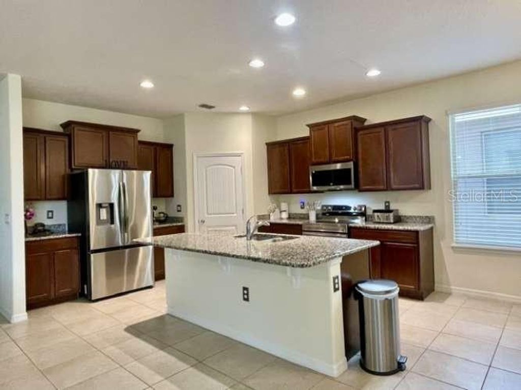 Photo of 8220 Bayview Crossing Drive, Winter Garden, FL 34787 (MLS # TB8482364)