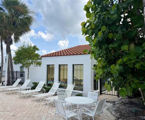 Photo of 1585 Tarpon Center Dr #21, Venice, FL 34285 (MLS # N6145369)