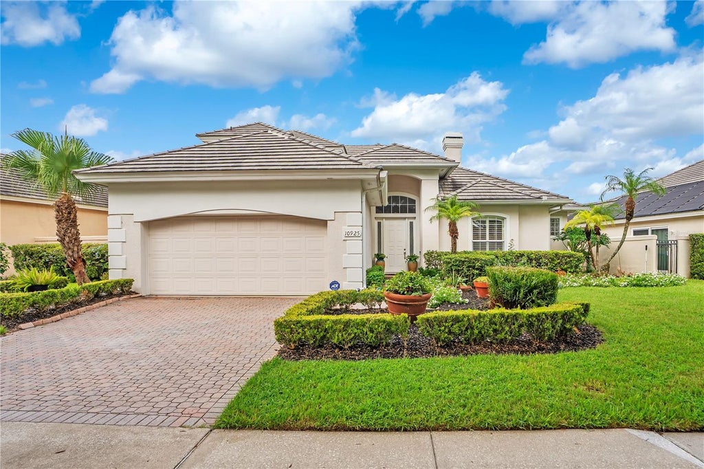 Photo of 10925 Woodchase Circle, Orlando, FL 32836 (MLS # O6435104)