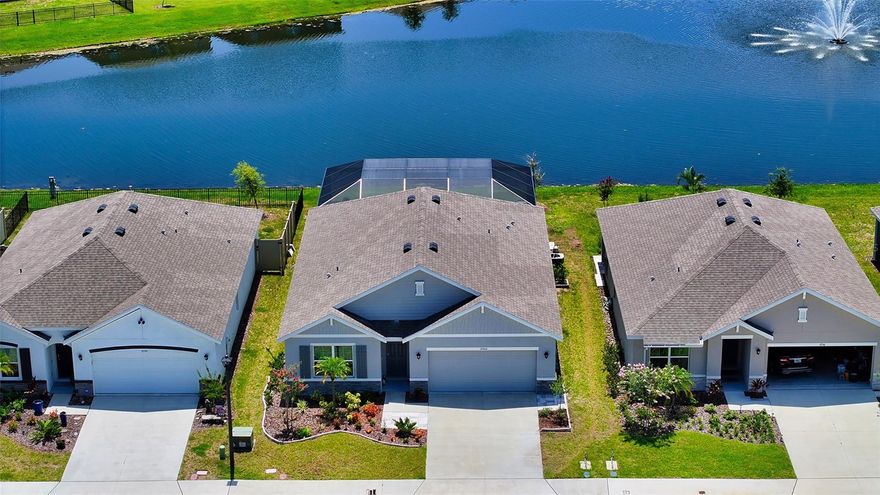 One year new lakefront pool home in Solera on Lakewood Ranch* This community is now maintenance free with the fee of $256 per month, this fee takes care of the ground maintenance & irrigation maintenance*  Why build when you could own this barely lived in home on one of the best water view lots in Solera* The owner has recently added a beautiful heated pool including upgraded paver patio, picture frame screening to enhance the amazing views, heat pump & pool heater* This "Cali" Model features 4 full bedrooms plus 2 full baths* Tile floors throughout the main living areas* Upgraded kitchen with white cabinets, granite counters, upgraded stainless appliances* Very open floor plan* 2 car attached garage with epoxy finish* Low monthly association fee includes irrigation water, common area maintenance, clubhouse, community pool & playground* Close to shopping, schools, restaurants & all that Lakewood Ranch has to offer*