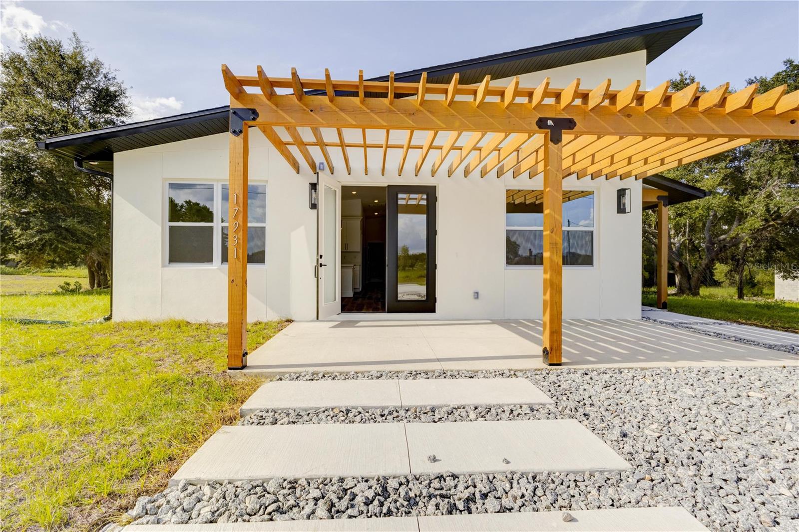 Experience the perfect mix of modern comfort and farmhouse charm in this brand-new 3-bedroom, 2-bath home, set on a lush 1-acre lot in one of Morriston’s nicest, most peaceful neighborhoods. Offering 1,696 sq ft of living space (2,036 sq ft total), this home is surrounded by beautiful greenery, open skies, and the tranquility of country living—just minutes from town conveniences.
Features You’ll Love:
• Farmhouse-inspired design – bright, airy spaces, rustic accents, and timeless finishes.
• Open-concept living – perfect for entertaining or enjoying cozy family nights.
• Spacious kitchen – ample cabinetry, generous counter space, and a welcoming layout that’s the heart of the home.
• Private owner’s suite – complete with a walk-in closet and a serene en-suite bathroom.
• Green views from every window – enjoy the beauty of mature trees and open space all around.
• Quiet, friendly neighborhood – a true community feel with room to breathe.
Why It’s Special:
This new construction delivers fresh finishes, energy efficiency, and a worry-free move-in experience. It’s the perfect retreat for those wanting a modern home with a warm, country soul.