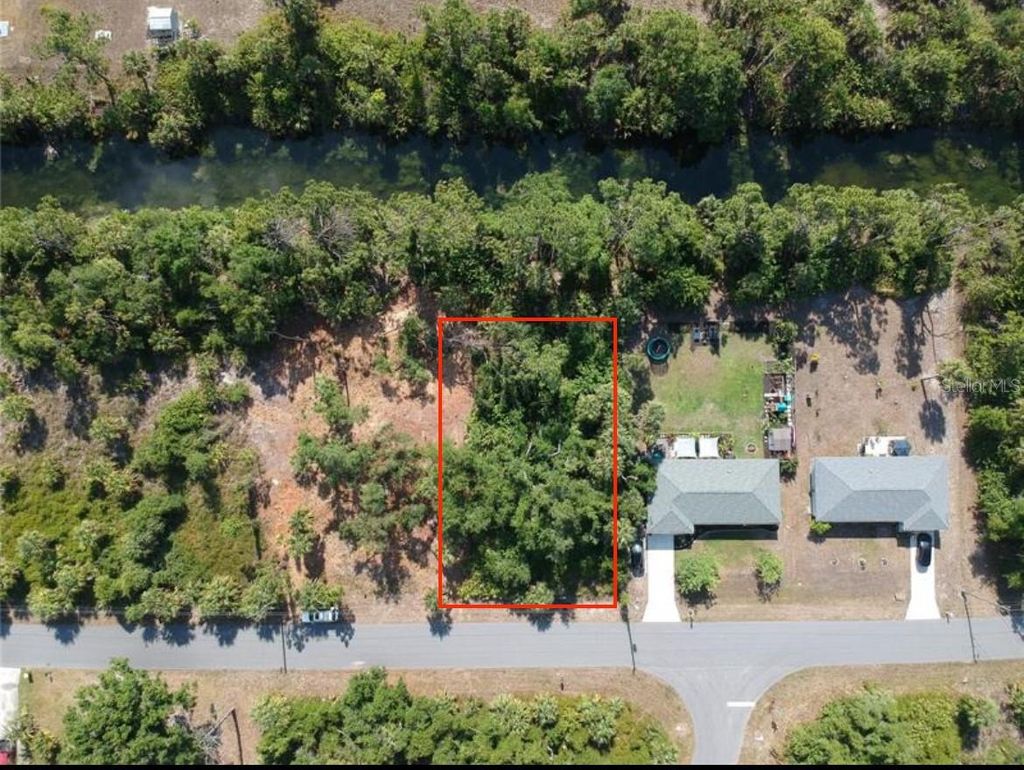Photo of 242 Longley Drive, Port Charlotte, FL 33954 (MLS # A4664751)