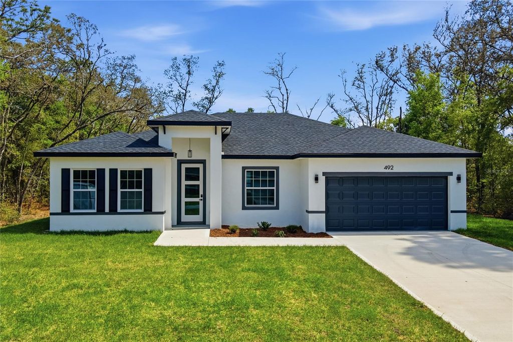 Photo of 492 W Union Place, Citrus Springs, FL 34434 (MLS # O6394285)