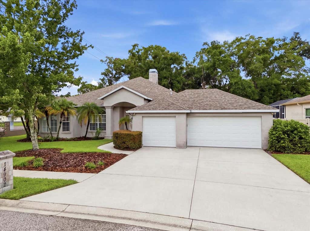 Photo of 14902 Devonshire Woods Place, Tampa, FL 33624 (MLS # TB8539326)